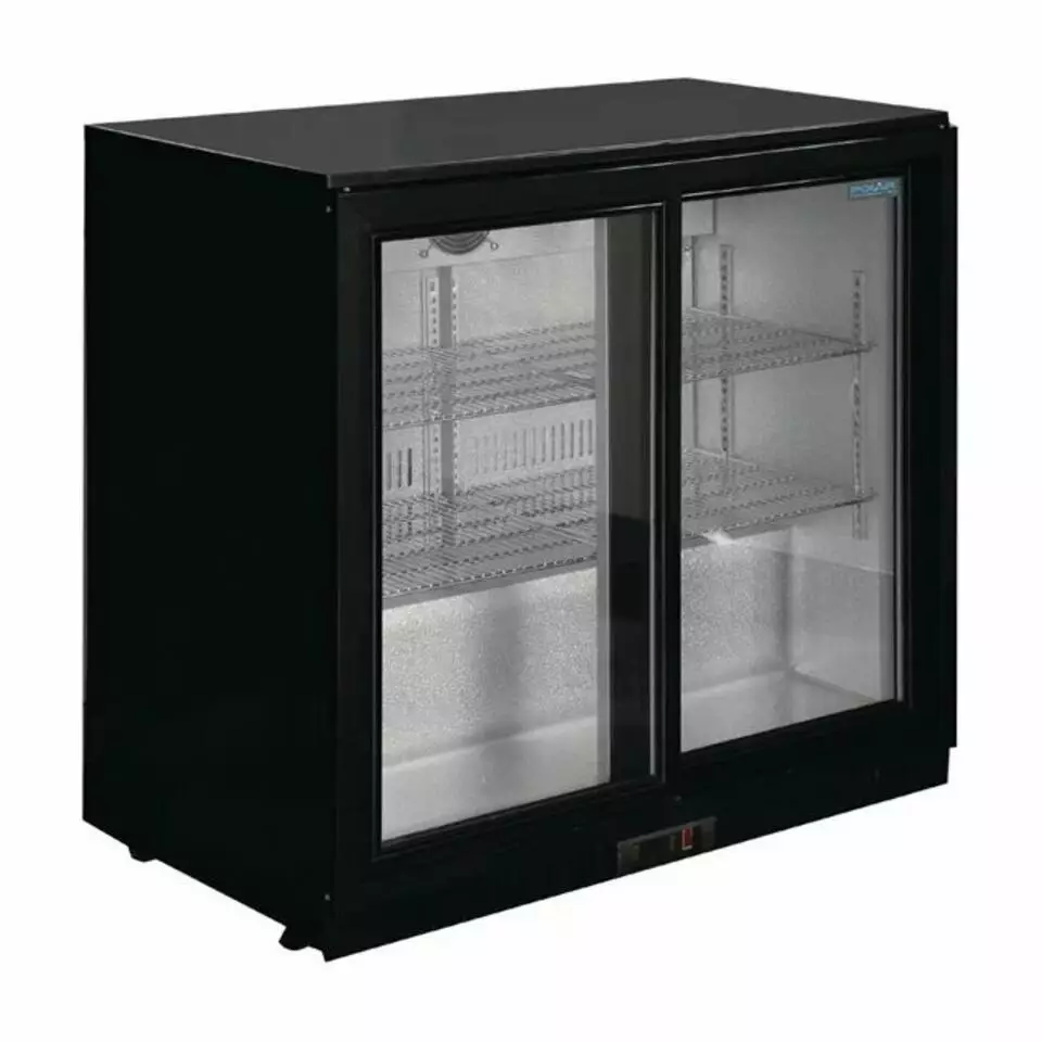 Double door commercial bottle coolers stocked for a delegate drinks reception